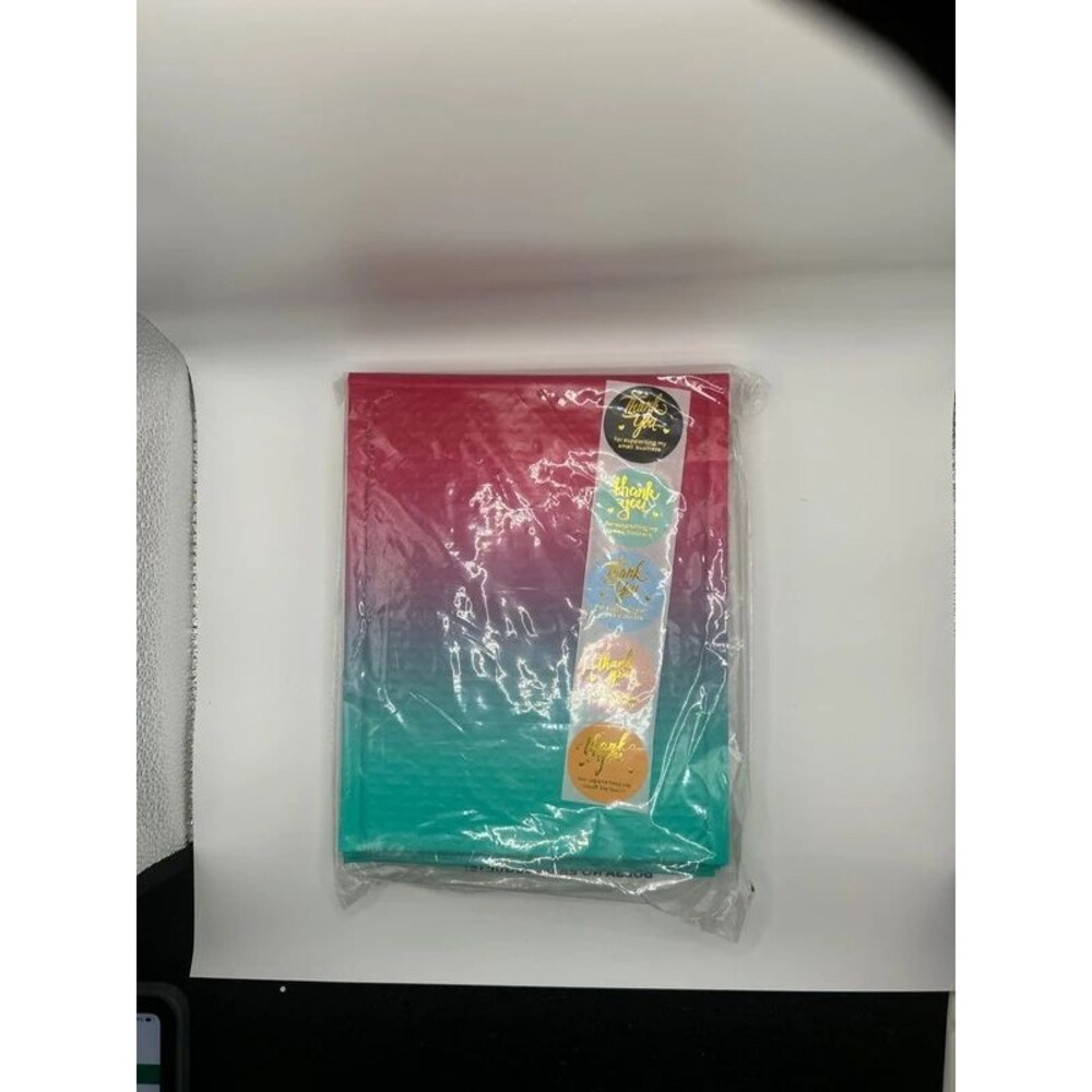 5 pack pink and green ombré matte bubble mailers with 5 stickers.